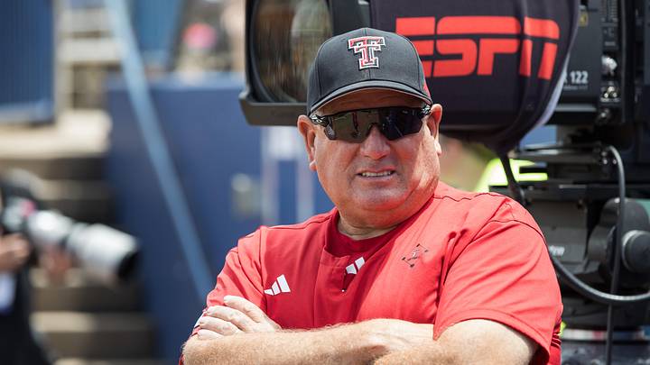 May 30, 2026; Oklahoma City, OK, USA; Texas Tech Red Raiders head coach Gerry Glasco watches warmups before the game against the Tennessee Lady Volunteers during the NCAA Women’s College World Series at Devon Park. Mandatory Credit: Brett Rojo-Imagn Images May 30, 2026; Oklahoma City, OK, USA; Texas Tech Red Raiders head coach Gerry Glasco watches warmups before the game against the Tennessee Lady Volunteers during the NCAA Women’s College World Series at Devon Park. Mandatory Credit: Brett Rojo-Imagn Images