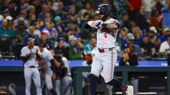 May 30, 2025; Seattle, Washington, USA; Minnesota Twins shortstop Carlos Correa (4) celebrates after hitting a two-run home run against the Seattle Mariners during the tenth inning at T-Mobile Park.