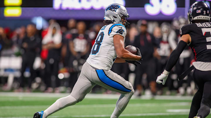 Jan 5, 2025; Atlanta, Georgia, USA; Carolina Panthers wide receiver Jalen Coker (18) runs after a catch against the Atlanta Falcons in overtime at Mercedes-Benz Stadium. Mandatory Credit: Brett Davis-Imagn Images Jan 5, 2025; Atlanta, Georgia, USA; Carolina Panthers wide receiver Jalen Coker (18) runs after a catch against the Atlanta Falcons in overtime at Mercedes-Benz Stadium. Mandatory Credit: Brett Davis-Imagn Images