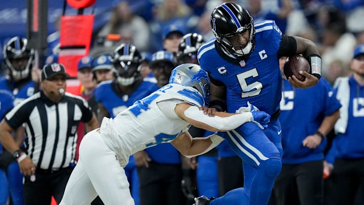 Detroit Lions linebacker Malcolm Rodriguez (44) pushes Indianapolis Colts quarterback Anthony Richardson (5) out of bounds Sunday, Nov. 24, 2024, during a game against the Detroit Lions at Lucas Oil Stadium in Indianapolis.