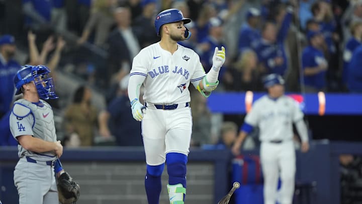 Nov 1, 2025; Toronto, Ontario, CAN; Toronto Blue Jays designated hitter Bo Bichette (11) reacts after hitting a three run home run against the Los Angeles Dodgers in the third inning during game seven of the 2025 MLB World Series at Rogers Centre. Mandatory Credit: John E. Sokolowski-Imagn Images