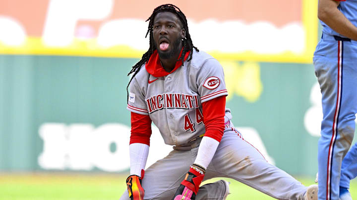 Apr 5, 2026; Arlington, Texas, USA; Cincinnati Reds shortstop Elly de la Cruz (44) steals second base past Texas Rangers second baseman Josh Smith (8) during the eighth inning at Globe Life Field. Mandatory Credit: Jerome Miron-Imagn Images