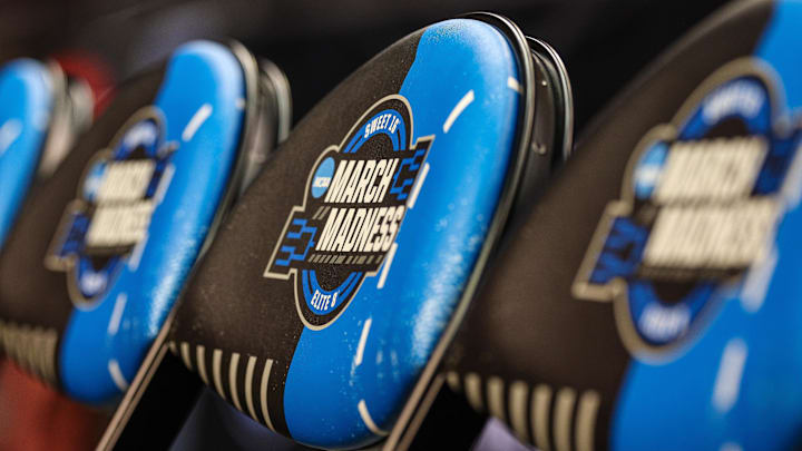 General view of the NCAA March Madness logo on sideline seats. General view of the NCAA March Madness logo on sideline seats.