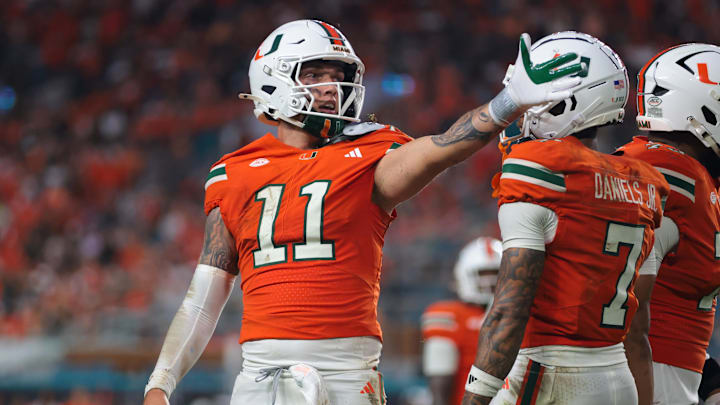 Sep 13, 2025; Miami Gardens, Florida, USA; Miami Hurricanes quarterback Carson Beck (11) reacts against the South Florida Bulls during the second quarter at Hard Rock Stadium. Mandatory Credit: Sam Navarro-Imagn Images Sep 13, 2025; Miami Gardens, Florida, USA; Miami Hurricanes quarterback Carson Beck (11) reacts against the South Florida Bulls during the second quarter at Hard Rock Stadium. Mandatory Credit: Sam Navarro-Imagn Images