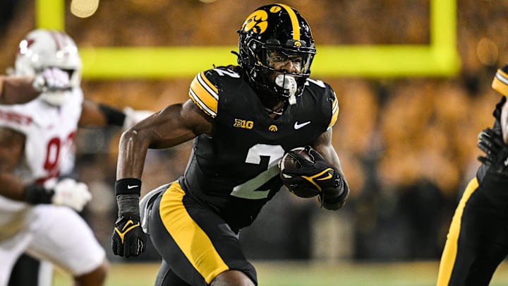 Nov 2, 2024; Iowa City, Iowa, USA; Iowa Hawkeyes running back Kaleb Johnson (2) runs the ball against the Wisconsin Badgers during the second quarter at Kinnick Stadium. 