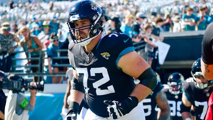 Jacksonville Jaguars offensive tackle Walker Little (72) runs on the field before an NFL football matchup Sunday, Nov. 19, 2023 at EverBank Stadium in Jacksonville, Fla. The Jacksonville Jaguars defeated the Tennessee Titans 34-14. [Corey Perrine/Florida Times-Union]