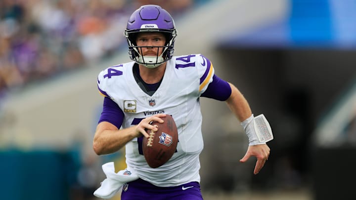 Minnesota Vikings quarterback Sam Darnold (14) is pressured out of the pocket and forced to run during the second quarter an NFL football matchup Sunday, Nov. 10, 2024 at Everbank Stadium in Jacksonville, Fla. The Vikings defeated the Jaguars 12-7. [Corey Perrine/Florida Times-Union]