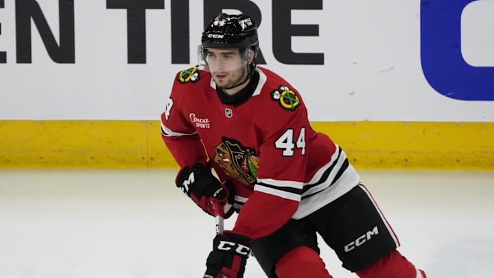 Mar 26, 2025; Chicago, Illinois, USA;Chicago Blackhawks defenseman Wyatt Kaiser (44) warms up before a game against the New Jersey Devils at United Center. Mandatory Credit: David Banks-Imagn Images