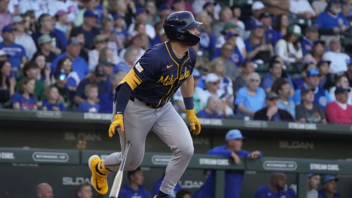 Mar 12, 2024; Mesa, Arizona, USA; Milwaukee Brewers center fielder Garrett Mitchell (5) hits a double against the Chicago Cubs in the first inning at Sloan Park.