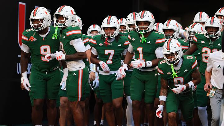 Sep 26, 2026; Miami Gardens, Florida, USA; Miami Hurricanes wide receiver Malachi Toney (1) leads his teammates onto the field before the game against the Central Michigan Chippewas at Hard Rock Stadium. Mandatory Credit: Sam Navarro-Imagn Images Sep 26, 2026; Miami Gardens, Florida, USA; Miami Hurricanes wide receiver Malachi Toney (1) leads his teammates onto the field before the game against the Central Michigan Chippewas at Hard Rock Stadium. Mandatory Credit: Sam Navarro-Imagn Images