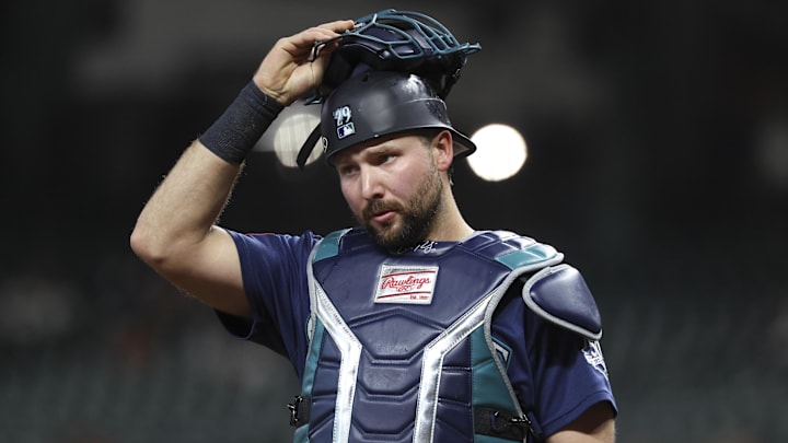 May 11, 2026; Houston, Texas, USA; Seattle Mariners catcher Cal Raleigh (29) puts on his mask after a play during the second inning against the Houston Astros at Daikin Park. Mandatory Credit: Troy Taormina-Imagn Images
