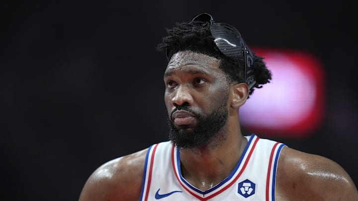 Dec 30, 2024; Portland, Oregon, USA; Philadelphia 76ers center Joel Embiid (21) looks on during the first half against the Portland Trail Blazers at Moda Center.