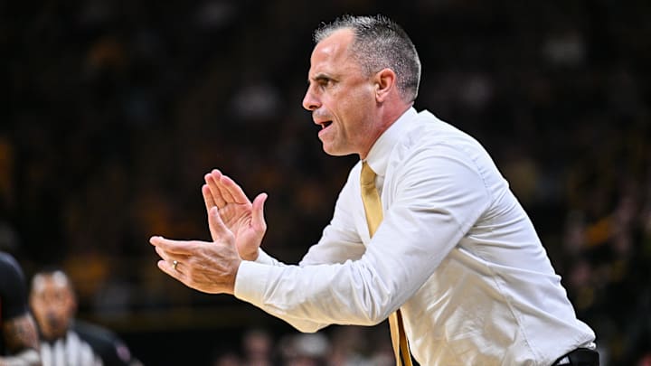 Dec 6, 2025; Iowa City, Iowa, USA; Iowa Hawkeyes head coach Ben McCollum reacts during the first half against the Maryland Terrapins at Carver-Hawkeye Arena. Mandatory Credit: Jeffrey Becker-Imagn Images Dec 6, 2025; Iowa City, Iowa, USA; Iowa Hawkeyes head coach Ben McCollum reacts during the first half against the Maryland Terrapins at Carver-Hawkeye Arena. Mandatory Credit: Jeffrey Becker-Imagn Images