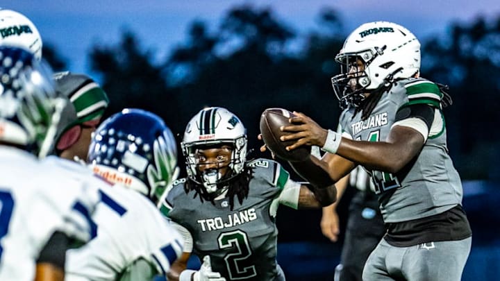 Evans senior quarterback Derone Rogers completed 16 of 18 passes for 246 yards and three touchdowns to guide the Trojans past Lake Howell, 47-7, on Sept. 26. It was the fifth consecutive victory for Evans (5-1).