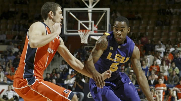 Jan 30, 2008; Auburn, AL USA;  LSU Tigers guard Marcus Thornton (5) moves around Auburn Tigers Matt Heramb (14) during the first half at Beard-Eaves Memorial Coliseum in Auburn.  Mandatory Credit:  John Reed-Imagn Images