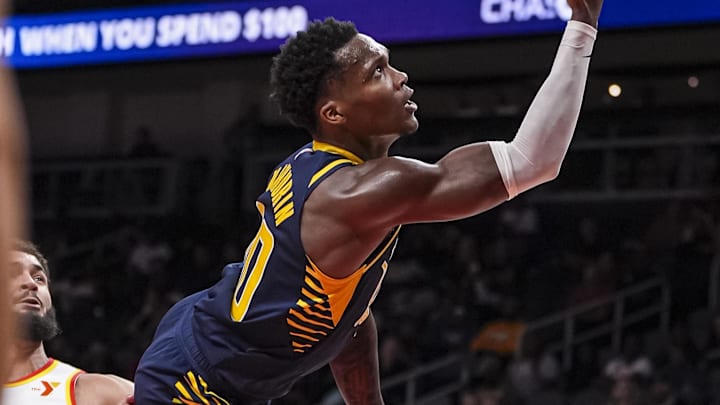 Oct 8, 2024; Atlanta, Georgia, USA; Indiana Pacers guard Bennedict Mathurin (00) runs into Atlanta Hawks forward Larry Nance Jr. (22) w while trying to score during the second half at State Farm Arena. Mandatory Credit: Dale Zanine-Imagn Images Oct 8, 2024; Atlanta, Georgia, USA; Indiana Pacers guard Bennedict Mathurin (00) runs into Atlanta Hawks forward Larry Nance Jr. (22) w while trying to score during the second half at State Farm Arena. Mandatory Credit: Dale Zanine-Imagn Images