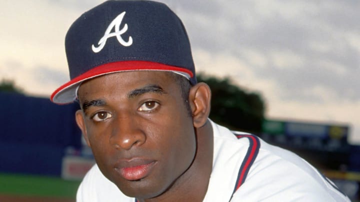 Mar 1992; West Pam Beach, FL, USA; FILE PHOTO; Atlanta Braves outfielder Deion Sanders in a spring training portrait at West Palm Beach Municipal Stadium. Mandatory Credit: Photo By Imagn Images (c) Copyright Imagn Images