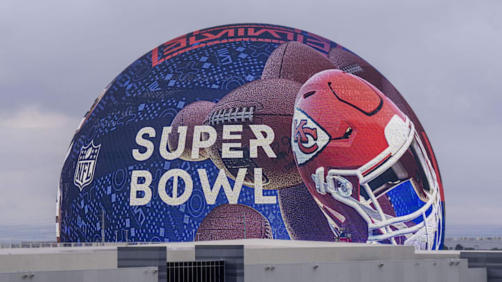 February 6, 2024; Las Vegas, NV, USA;  Kansas City Chiefs football helmet is displayed on Super Bowl LVIII signage on The Sphere. Mandatory Credit: Kyle Terada-Imagn Images