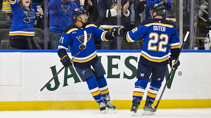 Mar 16, 2025; St. Louis, Missouri, USA; St. Louis Blues right wing Mathieu Joseph (71) is congratulated by defenseman Ryan Suter (22) after scoring against the Anaheim Ducks during the second period at Enterprise Center. Mandatory Credit: Jeff Curry-Imagn Images Mar 16, 2025; St. Louis, Missouri, USA; St. Louis Blues right wing Mathieu Joseph (71) is congratulated by defenseman Ryan Suter (22) after scoring against the Anaheim Ducks during the second period at Enterprise Center. Mandatory Credit: Jeff Curry-Imagn Images