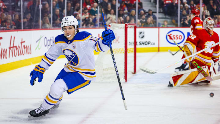Mar 24, 2024; Calgary, Alberta, CAN; Buffalo Sabres center Peyton Krebs (19) celebrates his goal against Calgary Flames goaltender Dustin Wolf (32) during the first period at Scotiabank Saddledome. Mandatory Credit: Sergei Belski-Imagn Images