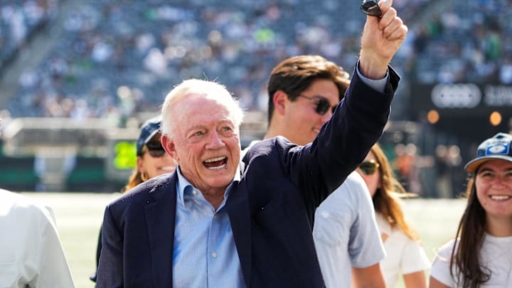 Dallas Cowboys Owner, President, and General Manager Jerry Jones waves on the field prior to a game against the New York Jets.