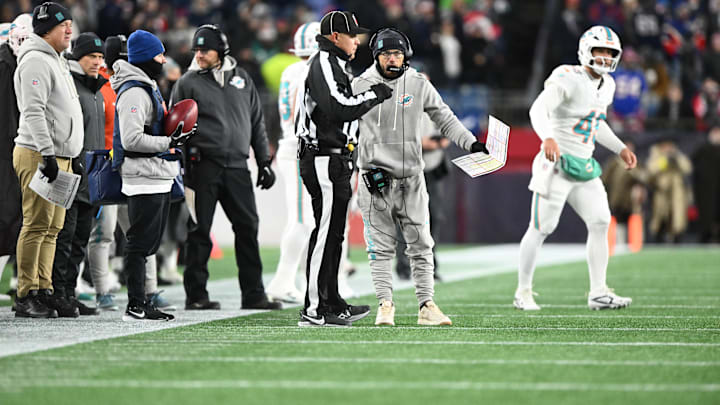 Miami Dolphins head coach Mike McDaniel talks with a referee on the field during the second quarter against the New England Patriots at Gillette Stadium. Miami Dolphins head coach Mike McDaniel talks with a referee on the field during the second quarter against the New England Patriots at Gillette Stadium.
