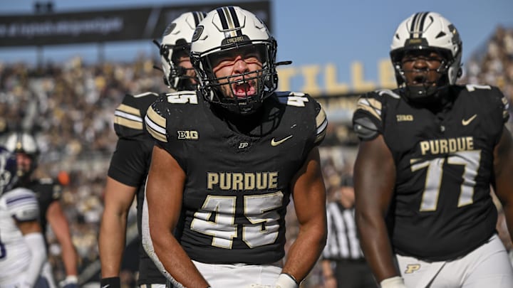 Purdue running back Devin Mockobee (45) celebrates a touchdown during the second half against Northwestern Purdue running back Devin Mockobee (45) celebrates a touchdown during the second half against Northwestern