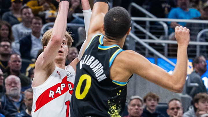 Feb 26, 2024; Indianapolis, Indiana, USA; Toronto Raptors guard Gradey Dick (1) shoots the ball while Indiana Pacers guard Tyrese Haliburton (0) defends in the first half at Gainbridge Fieldhouse. Mandatory Credit: Trevor Ruszkowski-Imagn Images Feb 26, 2024; Indianapolis, Indiana, USA; Toronto Raptors guard Gradey Dick (1) shoots the ball while Indiana Pacers guard Tyrese Haliburton (0) defends in the first half at Gainbridge Fieldhouse. Mandatory Credit: Trevor Ruszkowski-Imagn Images