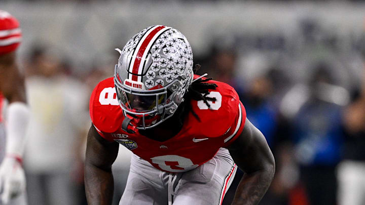 Dec 31, 2025; Arlington, TX, USA; Ohio State Buckeyes linebacker Arvell Reese (8) gets into position during the 2025 Cotton Bowl and quarterfinal game of the College Football Playoff at AT&T Stadium. Mandatory Credit: Jerome Miron-Imagn Images Dec 31, 2025; Arlington, TX, USA; Ohio State Buckeyes linebacker Arvell Reese (8) gets into position during the 2025 Cotton Bowl and quarterfinal game of the College Football Playoff at AT&T Stadium. Mandatory Credit: Jerome Miron-Imagn Images