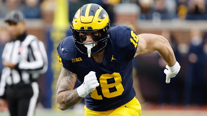 Nov 23, 2024; Ann Arbor, Michigan, USA;  Michigan Wolverines tight end Colston Loveland (18) runs a route against the Northwestern Wildcats at Michigan Stadium. Mandatory Credit: Rick Osentoski-Imagn Images