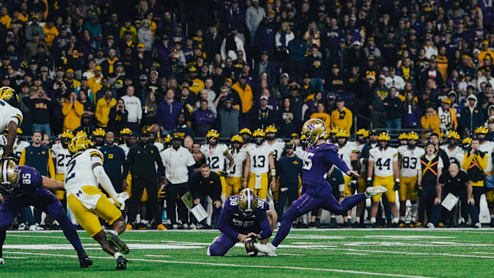 Grady Gross kicks a successful field goal against Michigan. 
