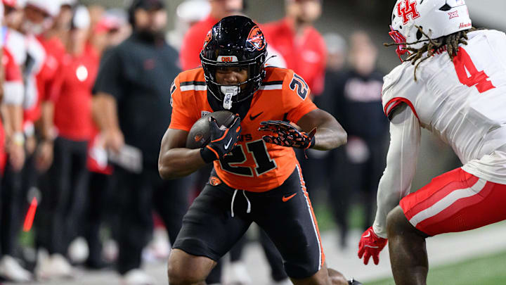 Sep 26, 2025; Corvallis, Oregon, USA; Oregon State Beavers running back Cornell Hatcher Jr. (21) runs the ball during overtime against the Houston Cougars at Reser Stadium. Mandatory Credit: Craig Strobeck-Imagn Images Sep 26, 2025; Corvallis, Oregon, USA; Oregon State Beavers running back Cornell Hatcher Jr. (21) runs the ball during overtime against the Houston Cougars at Reser Stadium. Mandatory Credit: Craig Strobeck-Imagn Images