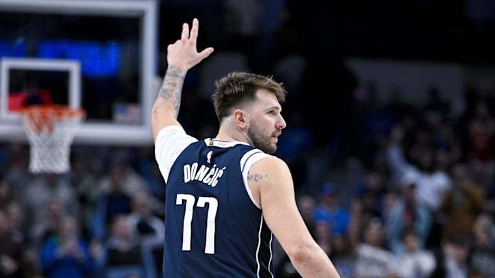 Feb 12, 2024; Dallas, Texas, USA; Dallas Mavericks guard Luka Doncic (77) celebrates during the second half of the game against the Washington Wizards at the American Airlines Center. Mandatory Credit: Jerome Miron-Imagn Images