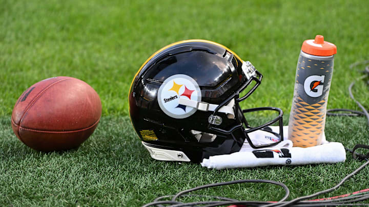 Aug 16, 2025; Pittsburgh, Pennsylvania, USA; A Pittsburgh Steelers helmet sits on the turf against the Tampa Bay Buccaneers during the first quarter at Acrisure Stadium. Mandatory Credit: Barry Reeger-Imagn Images