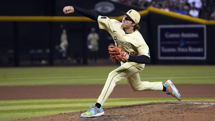 Apr 7, 2023; Phoenix, Arizona, USA; Arizona Diamondbacks relief pitcher Drey Jameson (99) throws against the Los Angeles Dodgers in the sixth inning at Chase Field. Mandatory Credit: Rick Scuteri-Imagn Images