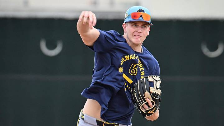 Milwaukee Brewers infielder Cooper Pratt throws across the infield during spring training workouts Monday, February 16, 2026, at American Family Fields of Phoenix in Phoenix, Arizona.