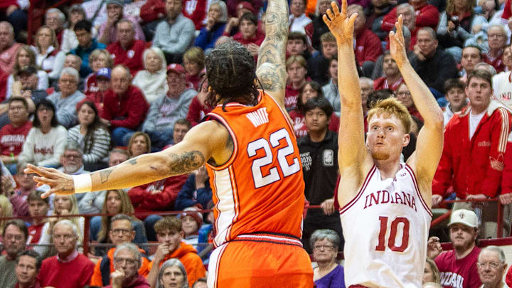 Indiana's Luke Goode (10) shoots over Illinois' Tre White (22) at Simon Skjodt Assembly Hall.