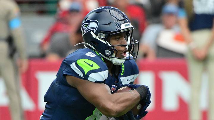 Sep 20, 2026; Glendale, Arizona, USA;  Seattle Seahawks running back Jadarian Price (8) runs with the ball in the first half against the Arizona Cardinals at State Farm Stadium.  Mandatory Credit: Matt Kartozian-Imagn Images