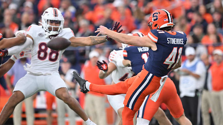 Nov 2, 2024; Syracuse, New York, USA; Syracuse Orange punter Jack Stonehouse (41) is pressured by Virginia Tech Hokies tight end Zeke Wimbush (88) during a punt in the first quarter at JMA Wireless Dome. Mandatory Credit: Mark Konezny-Imagn Images Nov 2, 2024; Syracuse, New York, USA; Syracuse Orange punter Jack Stonehouse (41) is pressured by Virginia Tech Hokies tight end Zeke Wimbush (88) during a punt in the first quarter at JMA Wireless Dome. Mandatory Credit: Mark Konezny-Imagn Images