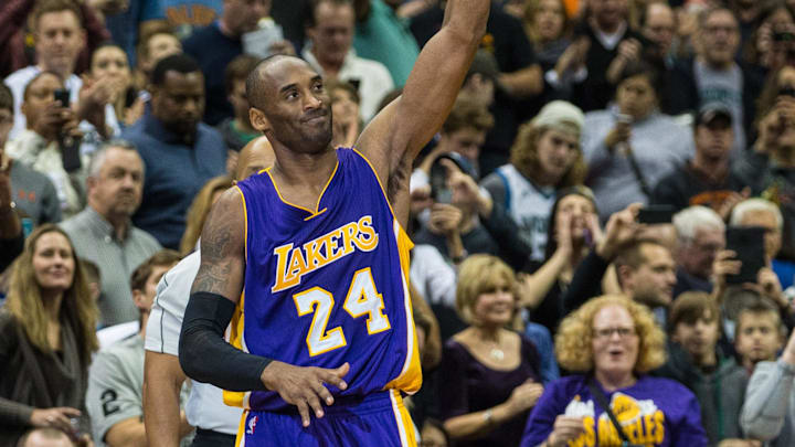 Dec 14, 2014; Minneapolis, MN, USA; Los Angeles Lakers guard Kobe Bryant (24) celebrates after surpassing Michael Jordan on the NBA All-Time Scoring List during the second quarter against the Minnesota Timberwolves at Target Center. Mandatory Credit: Brace Hemmelgarn-Imagn Images