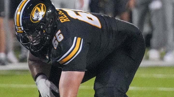 Aug 29, 2024; Columbia, Missouri, USA; Missouri Tigers offensive lineman Logan Reichert (66) on the line of scrimmage against the Murray State Racers during the game at Faurot Field at Memorial Stadium. Mandatory Credit: Denny Medley-Imagn Images