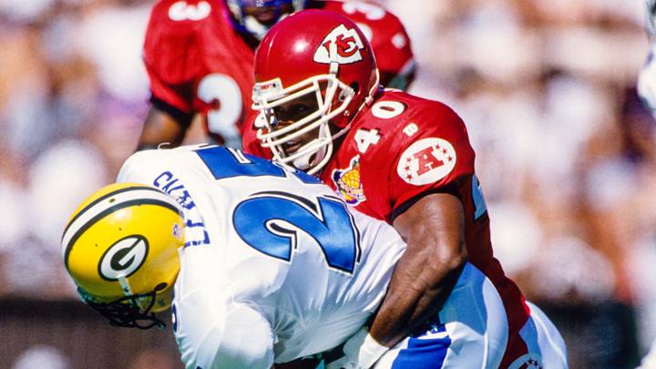 Feb 1, 1998; Honolulu, HI, USA; FILE PHOTO; AFC defensive lineman James Hasty (40) of the Kansas City Chiefs tackles NFC running back Dorsey Levens (25) during 1998 Pro Bowl at Aloha Stadium. Mandatory Credit: VJ Lovero-USA TODAY NETWORK