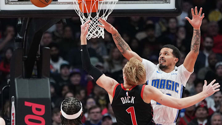 Toronto Raptors guard Gradey Dick (1) drives against Orlando Magic guard Cole Anthony (50) during the second quarter at Scotiabank Arena. Toronto Raptors guard Gradey Dick (1) drives against Orlando Magic guard Cole Anthony (50) during the second quarter at Scotiabank Arena.