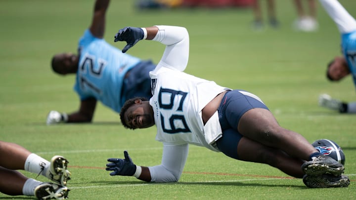 Tennessee Titans Sebastian Joseph-Day stretches during OTAs at Ascension Saint Thomas Sports Park in Nashville, Tenn., Wednesday, May 28, 2025.