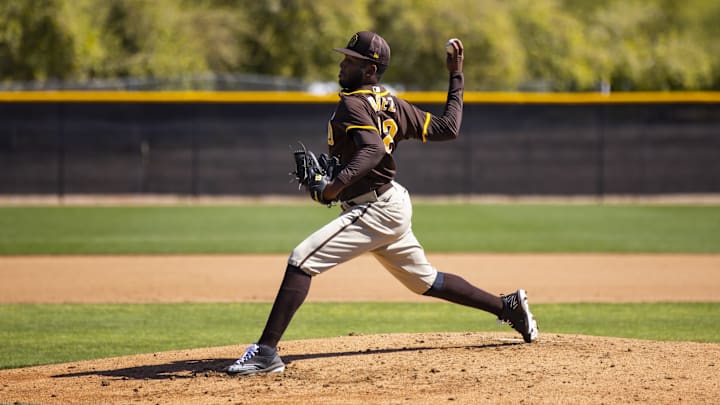 Mar 15, 2022; Peoria, AZ, USA; San Diego Padres pitcher Henry Baez during spring training workouts at the San Diego Padres Spring Training Complex. Mandatory Credit: Mark J. Rebilas-Imagn Images Mar 15, 2022; Peoria, AZ, USA; San Diego Padres pitcher Henry Baez during spring training workouts at the San Diego Padres Spring Training Complex. Mandatory Credit: Mark J. Rebilas-Imagn Images