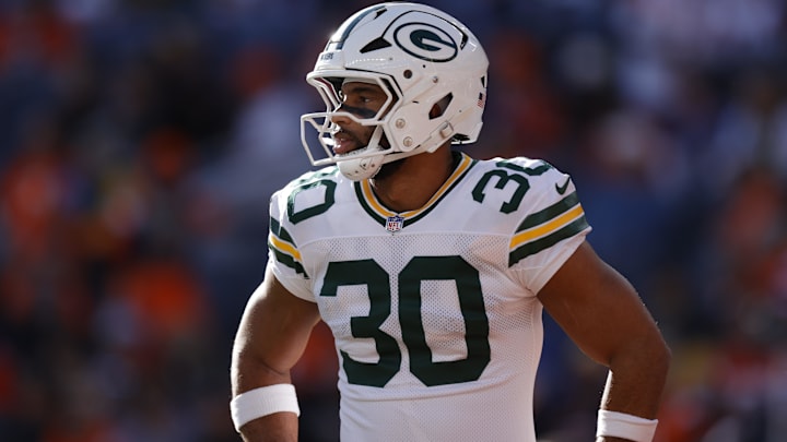 Dec 14, 2025; Denver, Colorado, USA; Green Bay Packers running back Chris Brooks (30) warms up before a game against the Denver Broncos at Empower Field at Mile High.