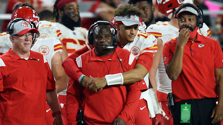 Aug 20, 2021; Glendale, Arizona, USA; Kansas City Chiefs quarterback Patrick Mahomes (15) hugs offensive coordinator Eric Bieniemy during the second half of the game against the Arizona Cardinals at State Farm Stadium. Mandatory Credit: Joe Camporeale-Imagn Images
