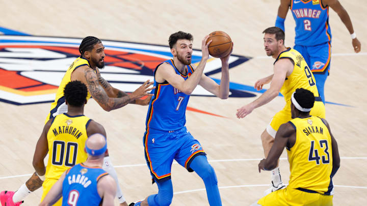 Jun 22, 2025; Oklahoma City, Oklahoma, USA; Oklahoma City Thunder forward Chet Holmgren (7) drives to the basket against Indiana Pacers forward Pascal Siakam (43) during the first half of game seven of the 2025 NBA Finals at Paycom Center. Mandatory Credit: Alonzo Adams-Imagn Images