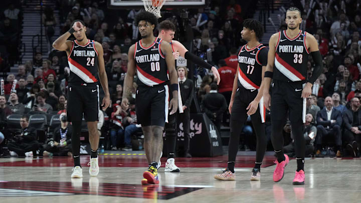 Jan 14, 2025; Portland, Oregon, USA: Portland Trail Blazers (from left to right) Kris Murray (24), Scoot Henderson (00), Donovan Clingan (23),  Shaedon Sharpe (17) and Toumani Camara (33) walk back to the court after a timeout during the second half against the Brooklyn Nets at Moda Center. Mandatory Credit: Soobum Im-Imagn Images