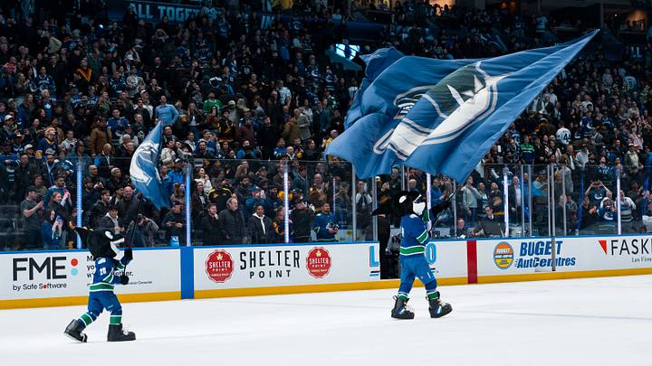 Apr 14, 2026; Vancouver, British Columbia, CAN; Fin the mascot and the Vancouver Canucks celebrate their victory against the Los Angeles Kings at Rogers Arena. Mandatory Credit: Bob Frid-Imagn Images Apr 14, 2026; Vancouver, British Columbia, CAN; Fin the mascot and the Vancouver Canucks celebrate their victory against the Los Angeles Kings at Rogers Arena. Mandatory Credit: Bob Frid-Imagn Images